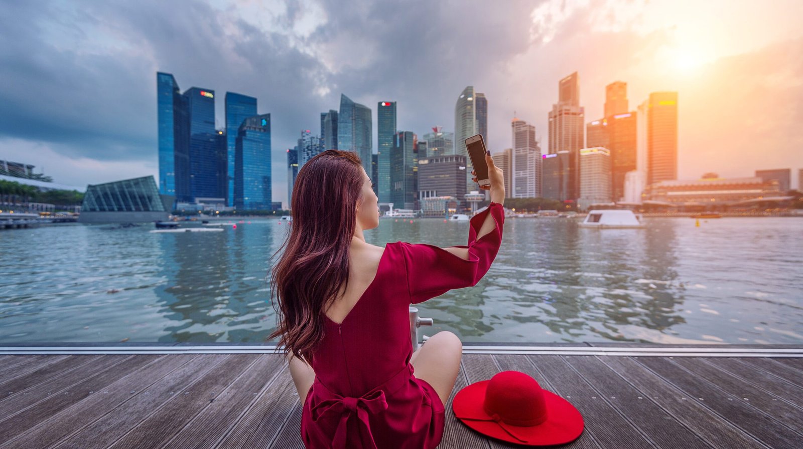 Young woman take a photos in Singapore.